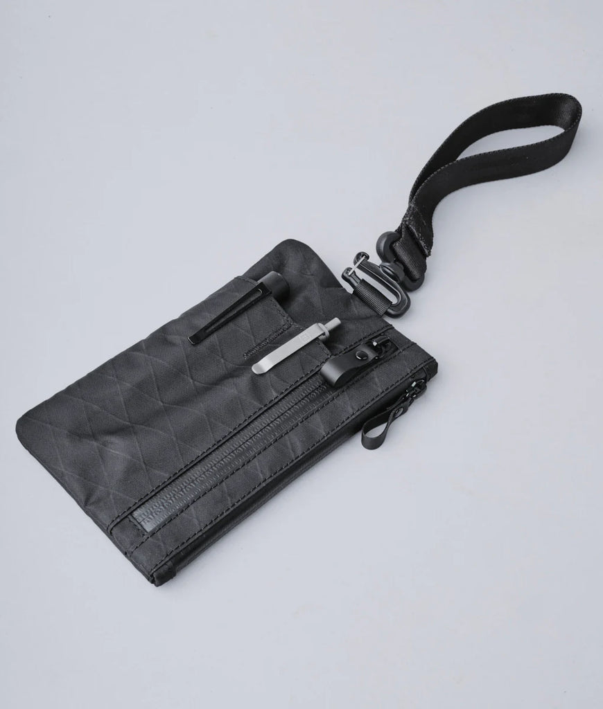 ALPAKA Zip Clutch